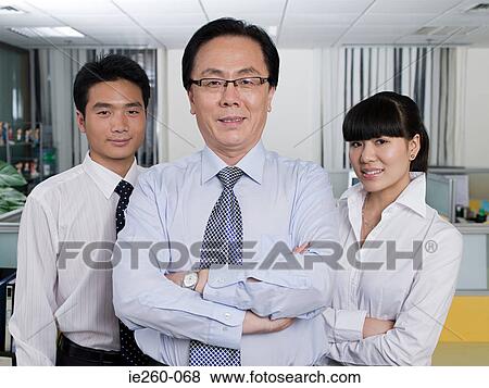 Colleagues in office View Large Photo Image Stock Photo - Colleagues in office. Fotosearch