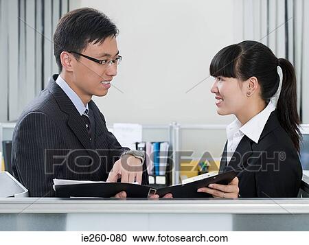 Colleagues with file View Large Photo Image Stock Image - Colleagues with file. Fotosearch