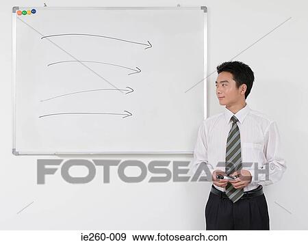Man giving a presentation View Large Photo Image Stock Photo - Man giving a presentation. Fotosearch
