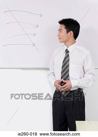 Man giving presentation View Large Photo Image Stock Photo - Man giving presentation. Fotosearch