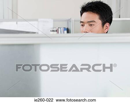 Stock Image - Man in office. Fotosearch