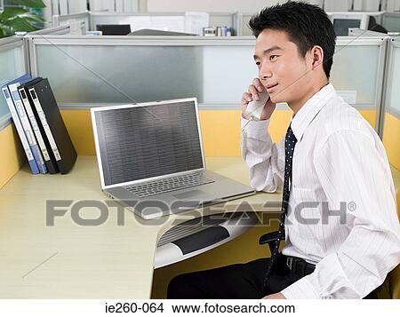 Office worker on telephone View Large Photo Image Picture - Office worker on telephone. Fotosearch
