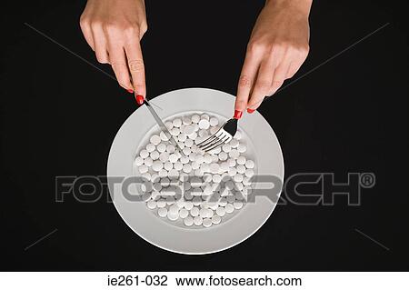 Eating pills View Large Photo Image Stock Image - Eating pills. Fotosearch