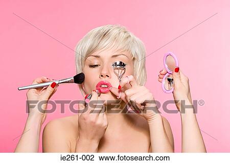 Woman being made up View Large Photo Image Stock Image - Woman being made up. Fotosearch