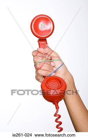 Woman with telephone and rubber bands View Large Photo Image Picture - Woman with telephone and rubber bands. Fotosearch