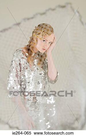 Young woman as fish caught in net View Large Photo Image Stock Photography - Young woman as fish caught in net. Fotosearch