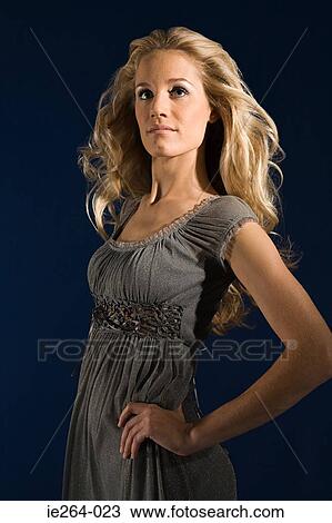 Young woman looking up View Large Photo Image Stock Image - Young woman looking up. Fotosearch