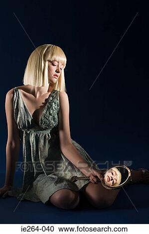 Young woman with mirror View Large Photo Image Stock Image - Young woman with mirror. Fotosearch