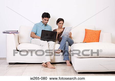 A couple sorting out finances View Large Photo Image Stock Image - A couple sorting out finances. Fotosearch