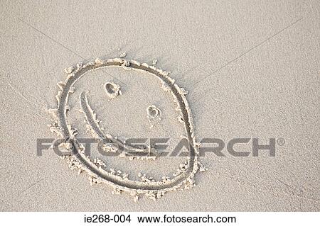 Smiley face in the sand View Large Photo Image Picture - Smiley face in the sand. Fotosearch