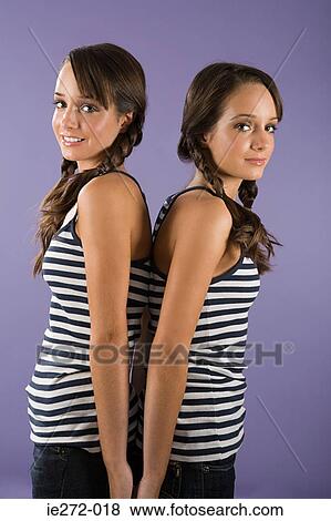 Stock Photo - Twin sisters. Fotosearch