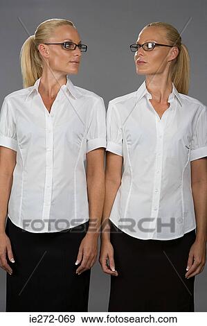 Twin sisters View Large Photo Image Stock Photo - Twin sisters. Fotosearch