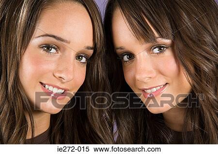 Stock Photography - Twin sisters. Fotosearch