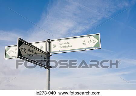 Stock Image - Arrow sign for a cycle path. Fotosearch