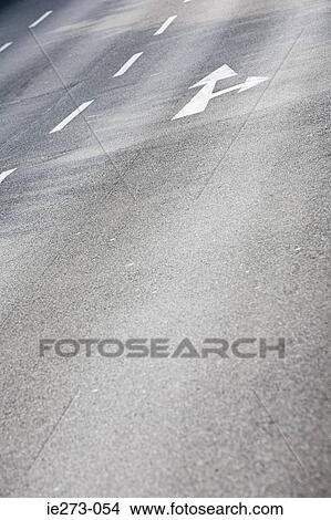 Arrow signs on a road View Large Photo Image Picture - Arrow signs on a road. Fotosearch
