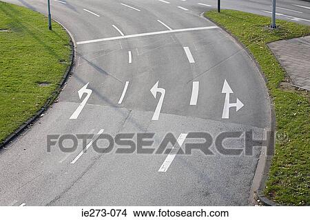Arrow signs on a road View Large Photo Image Picture - Arrow signs on a road. Fotosearch