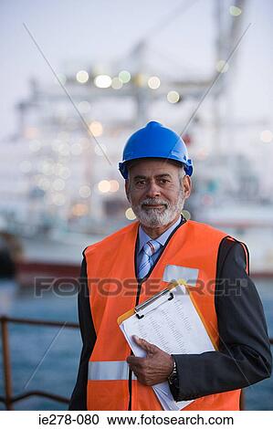Engineer at harbour View Large Photo Image Stock Image - Engineer at harbour. Fotosearch