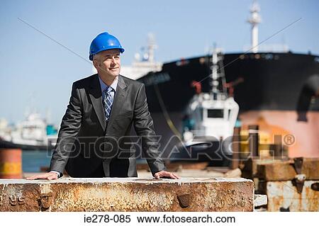 Stock Photography - Engineer at harbour. Fotosearch