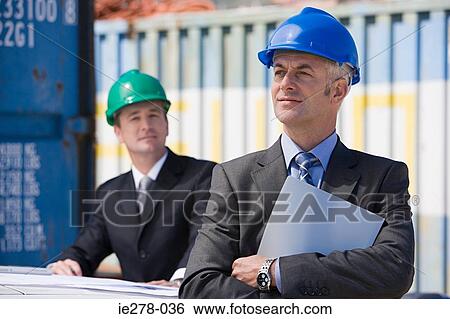 Stock Photograph - Engineers at container terminal. Fotosearch