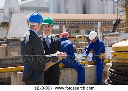 Engineers at harbour View Large Photo Image Stock Photo - Engineers at harbour. Fotosearch