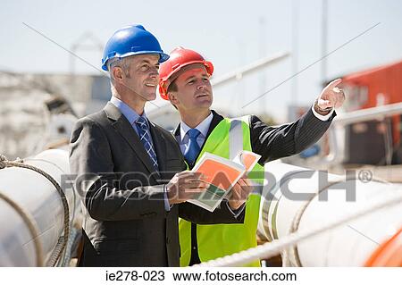 Stock Image - Engineers at work. Fotosearch