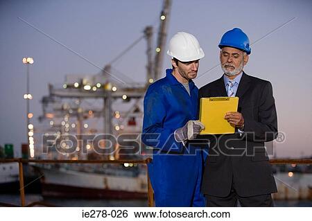 Stock Photograph - Working at harbour. Fotosearch