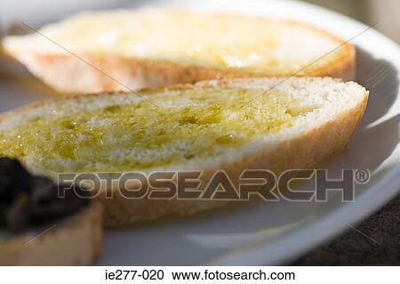 Bruschetta with olive oil View Large Photo Image Stock Image - Bruschetta with olive oil . Fotosearch