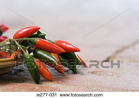 Chilli peppers View Large Photo Image Stock Image - Chilli peppers. Fotosearch