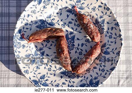 Sausages on a plate View Large Photo Image Stock Image - Sausages on a plate. Fotosearch