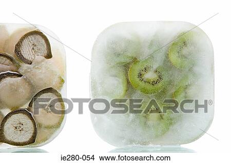 Frozen bananas and kiwi fruit View Large Photo Image Picture - Frozen bananas and kiwi fruit. Fotosearch