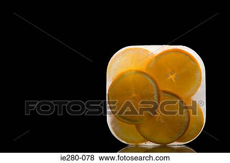 Frozen oranges View Large Photo Image Stock Photo - Frozen oranges. Fotosearch