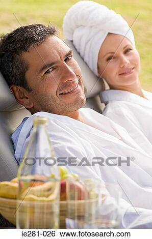 A couple relaxing at a health farm View Large Photo Image Stock Photograph - A couple relaxing at a health farm. Fotosearch