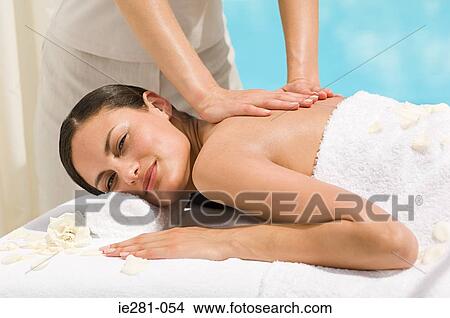 A woman having a massage View Large Photo Image Picture - A woman having a massage. Fotosearch