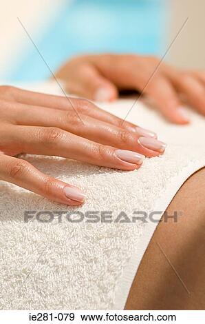Stock Photo - A woman having a massage. Fotosearch