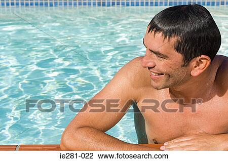Man in a swimming pool View Large Photo Image Stock Image - Man in a swimming pool. Fotosearch