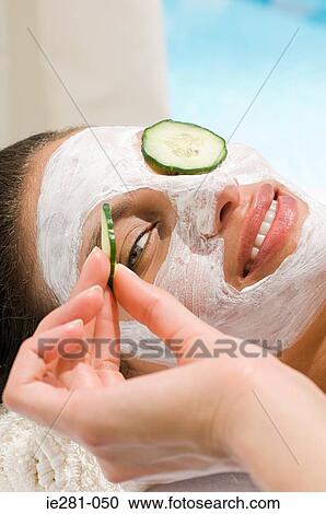 Young woman wearing a face mask View Large Photo Image Stock Image - Young woman wearing a face mask. Fotosearch