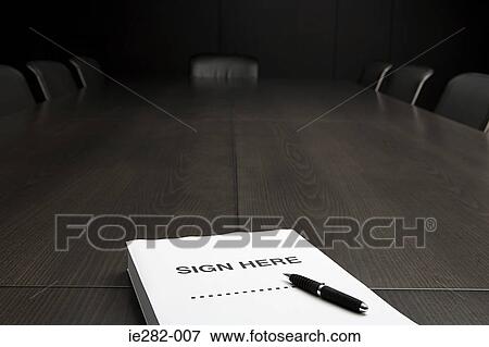 Contract on a conference table View Large Photo Image Stock Photo - Contract on a conference table. Fotosearch