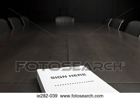 Stock Photo - Contract on a conference table. Fotosearch