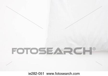 Stock Image - Edge of a white pillow. Fotosearch