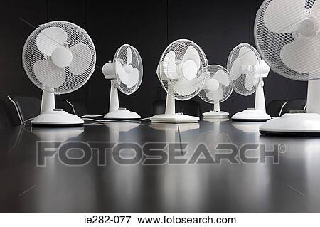 Electric fans on a conference table View Large Photo Image Stock Photo - Electric fans on a conference table. Fotosearch