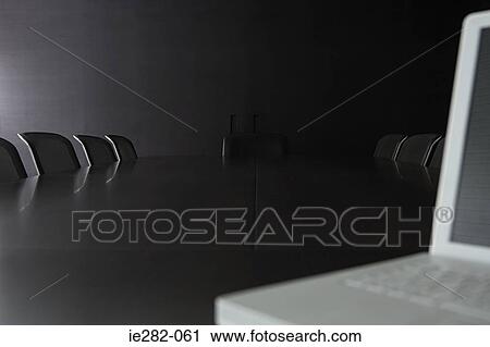 Laptop computer in an empty board room View Large Photo Image Stock Image - Laptop computer in an empty board room. Fotosearch