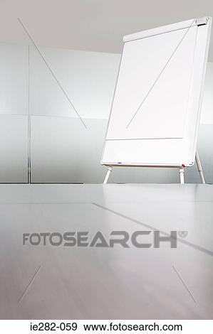 Stock Photo - Whiteboard in an empty office. Fotosearch