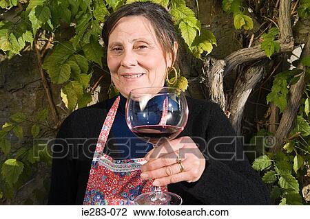 Italian woman drinking red wine View Large Photo Image Stock Image - Italian woman drinking red wine. Fotosearch