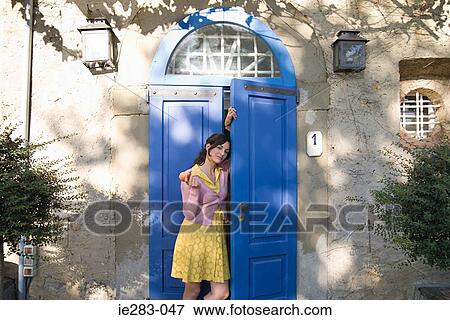 Italian woman standing in doorway View Large Photo Image Stock Photo - Italian woman standing in doorway. Fotosearch