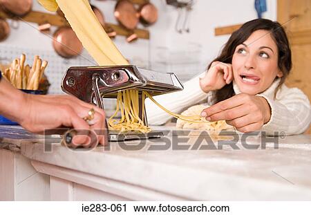 Italian women making pasta View Large Photo Image Stock Image - Italian women making pasta. Fotosearch