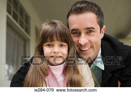 Stock Photo - Portrait of a father and daughter. Fotosearch