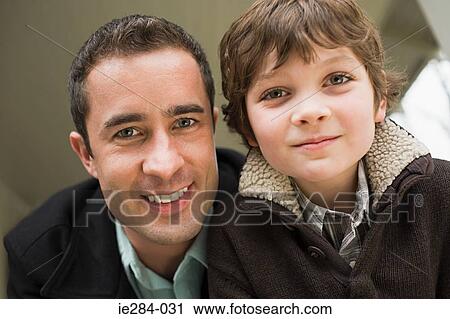Stock Image - Portrait of a father and son. Fotosearch
