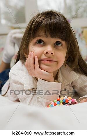 Stock Image - Portrait of a girl . Fotosearch