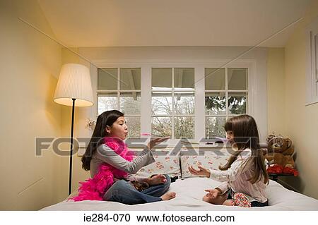 Sisters in their bedroom View Large Photo Image Stock Image - Sisters in their bedroom. Fotosearch