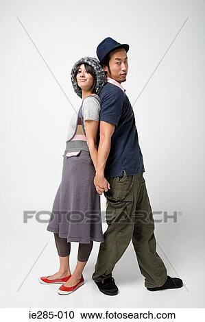 Japanese couple holding hands View Large Photo Image Stock Image - Japanese couple holding hands. Fotosearch